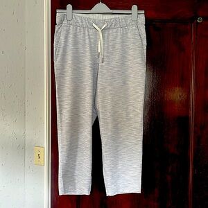 Lululemon Keep Moving Pant 7/8.  Grey/white pinstripe.